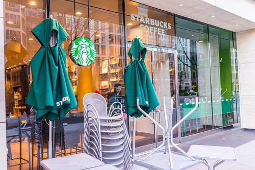 Starbucks to pay employees for charity work