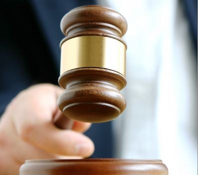 Alleged inside trader sues for wrongful dismissal