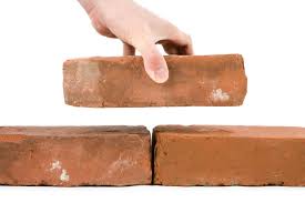Staff offered bricks to compensate unpaid wages
