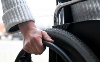Worker slammed over “cripple” slur