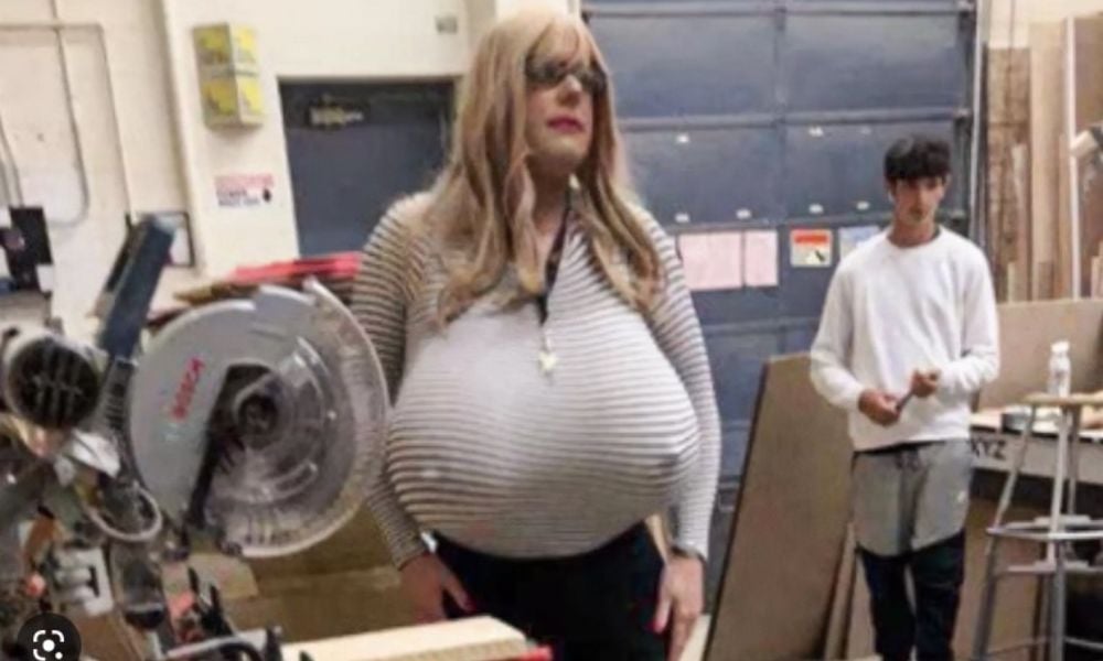 No dress code for teacher wearing large prosthetic breasts
