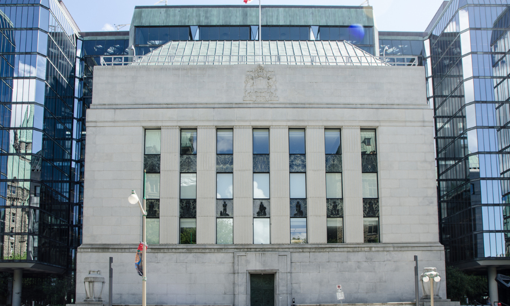 Bank of Canada cuts rates again, loonie stays steady