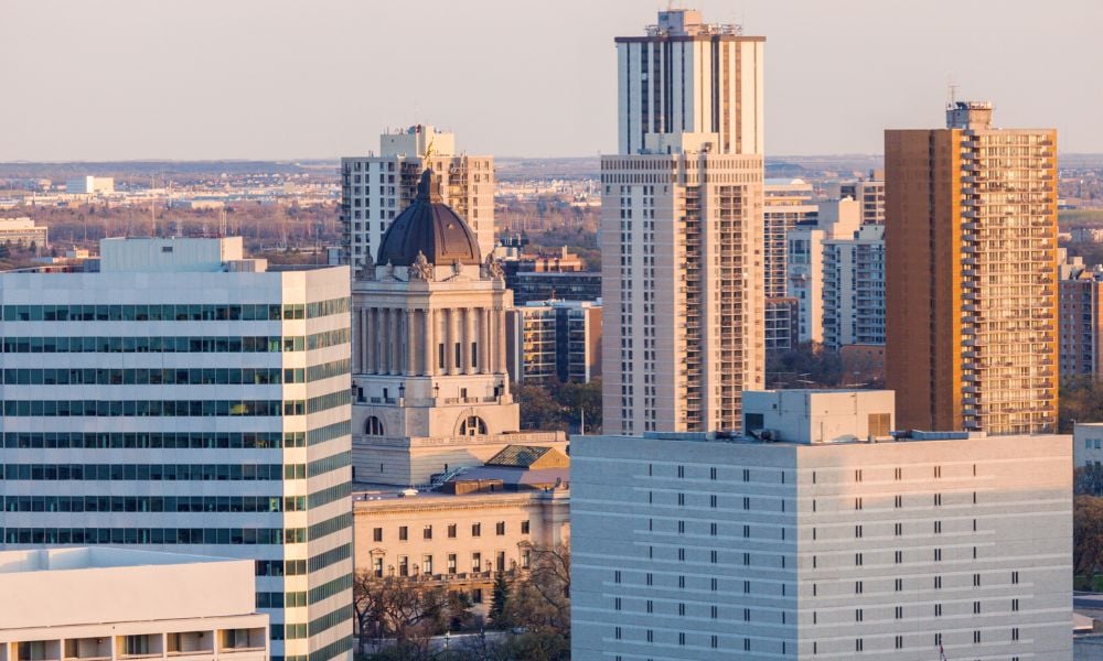 Province says hybrid policy to continue despite other governments clamping down on remote work