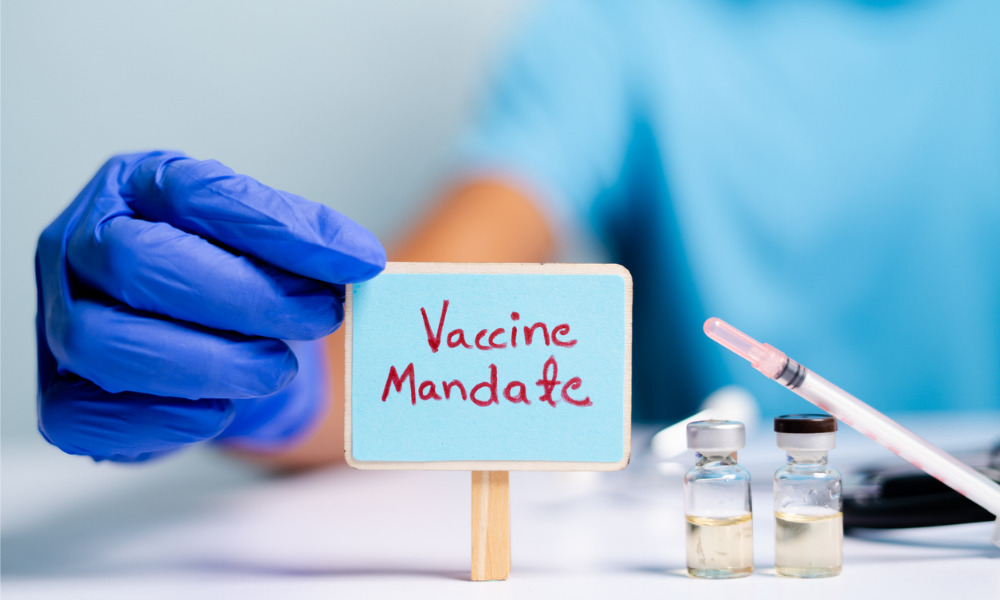Canadian arbitrator upholds mandatory vaccination policy for employees who work indoors