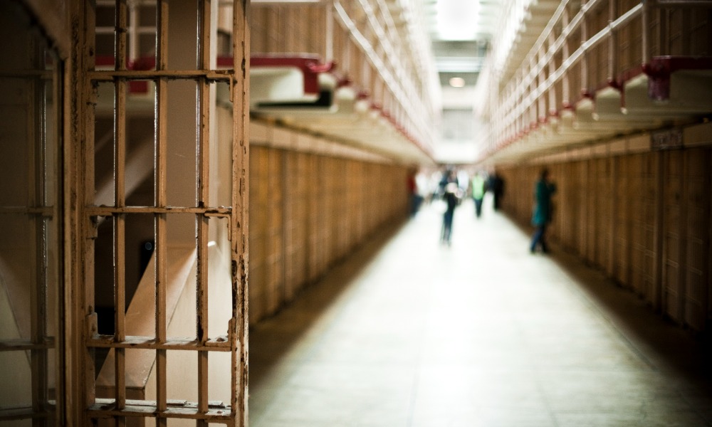 Worker who went to jail argues he was ‘still employed’ during incarceration