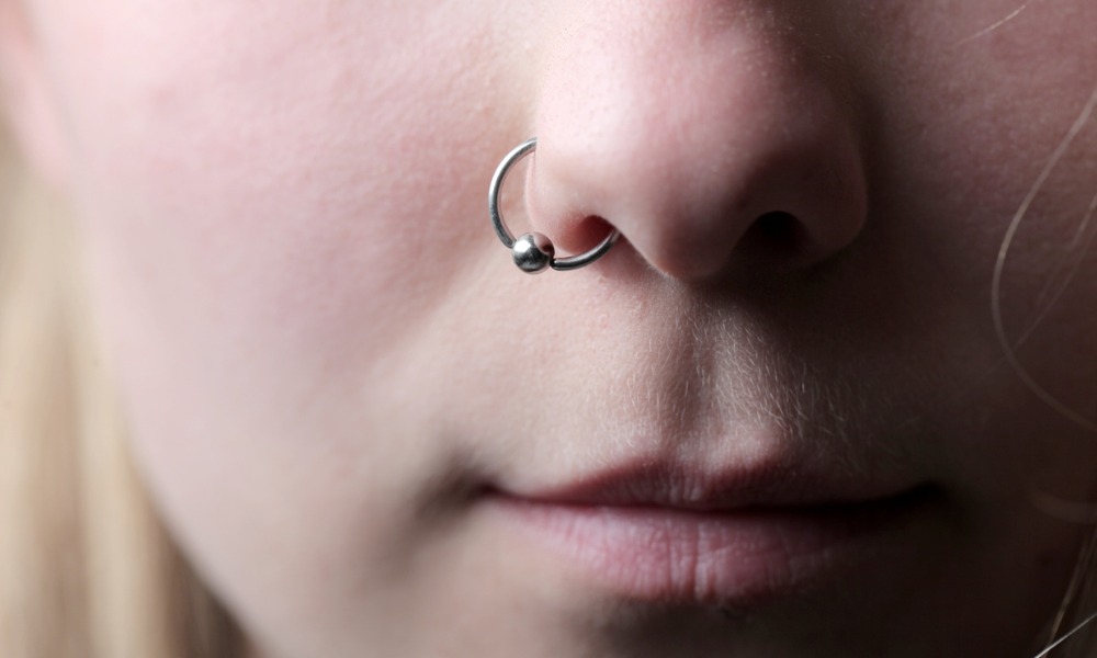 Worker resigns over manager's comments on her 'facial piercings and weight'
