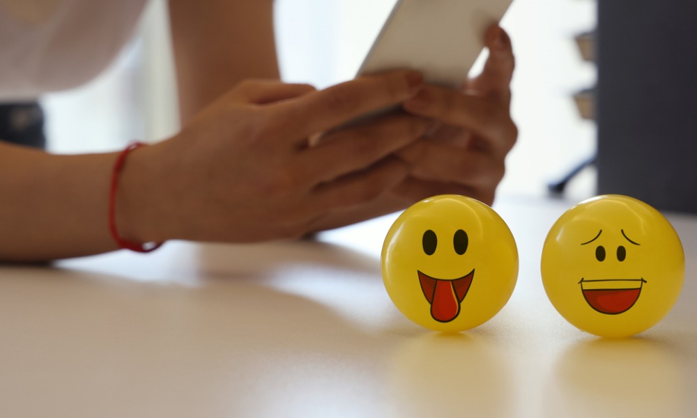 How many Kiwis use emojis in the workplace?
