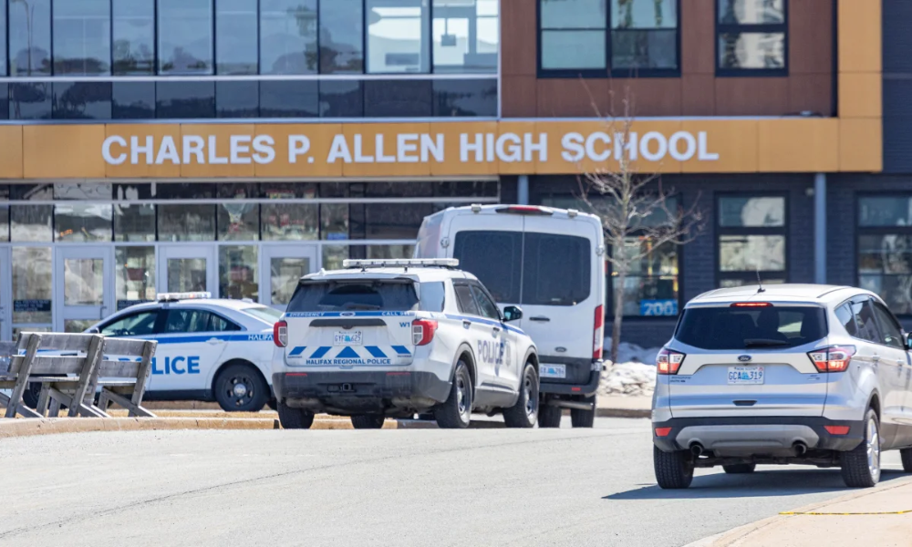 Two high school staff and a student hurt in stabbing incident