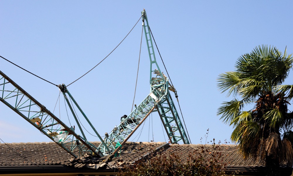 One worker injured as crane falls over