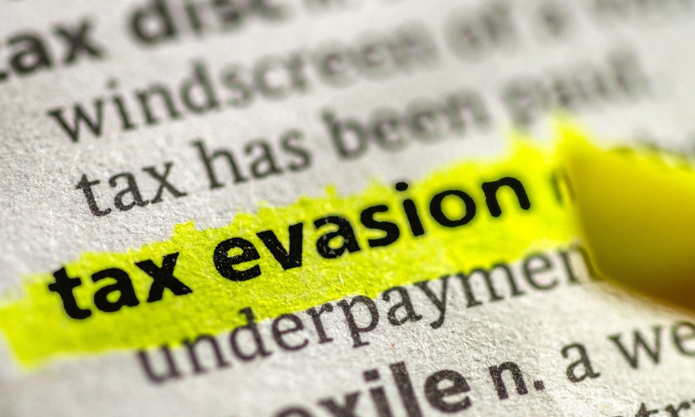 Retired lawyer cops suspension for tax evasion