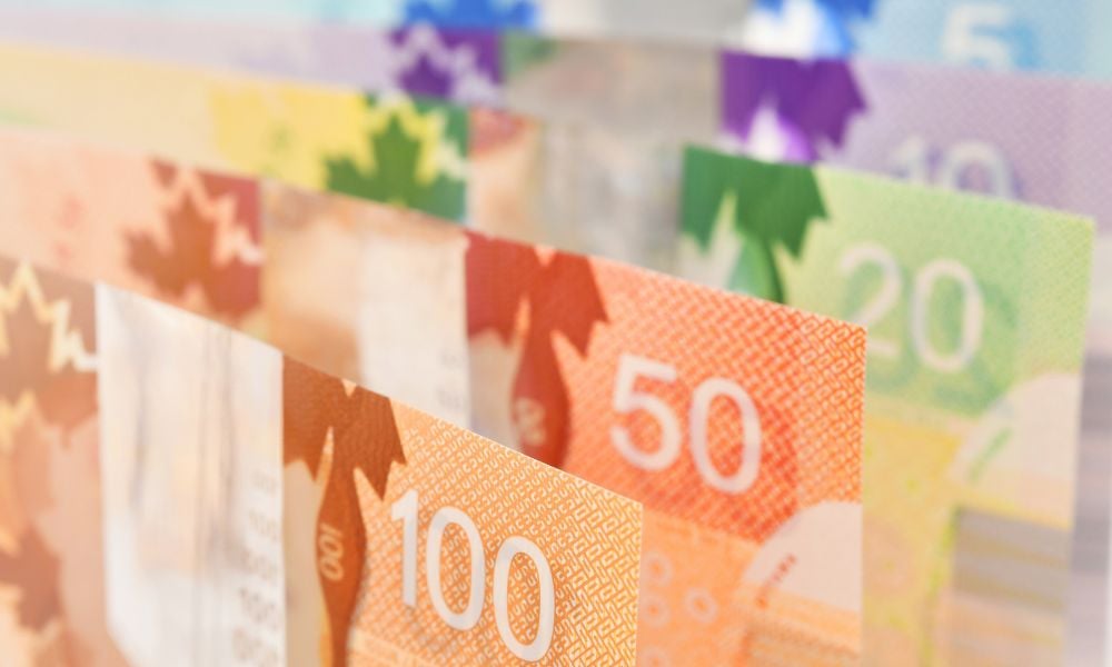 Cutting government debt could give Canadians a $2,100 pay rise, report says