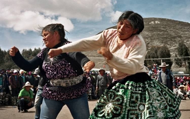 Lighter Side: Peru fighting festival lets workers beat up their boss