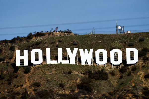 Hollywood writers reach tentative deal with studios, averting strike