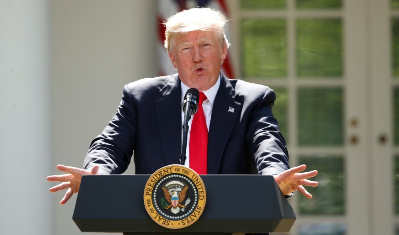 Big U.S. companies stay on White House panel despite climate jolt