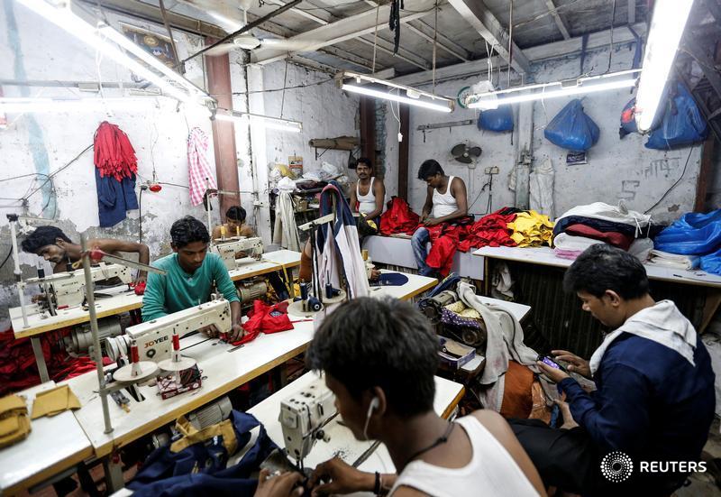 India's new tax makes 'untouchables' of small firms, hurts informal workers