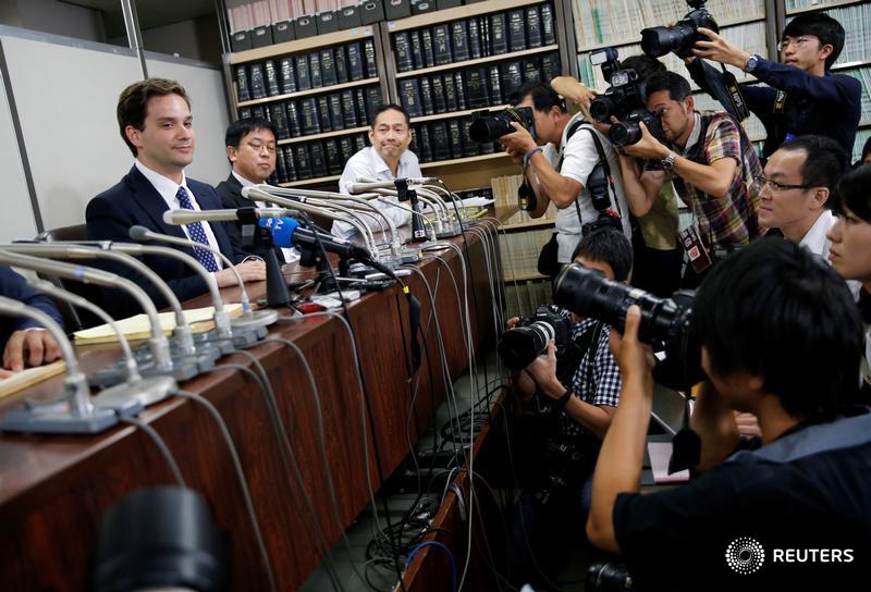 Chief of bitcoin exchange Mt. Gox denies embezzlement as trial opens