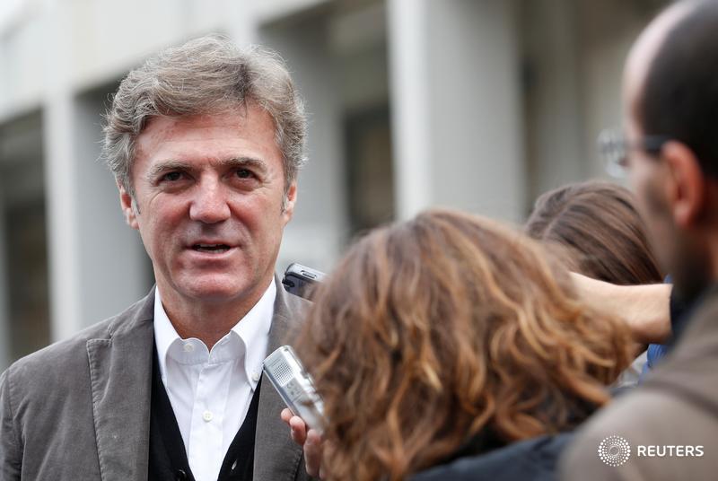 Telecom Italia boss defends multi-million euro severance pay