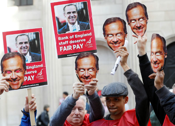 Bank of England staff members begin first strike in 50 years