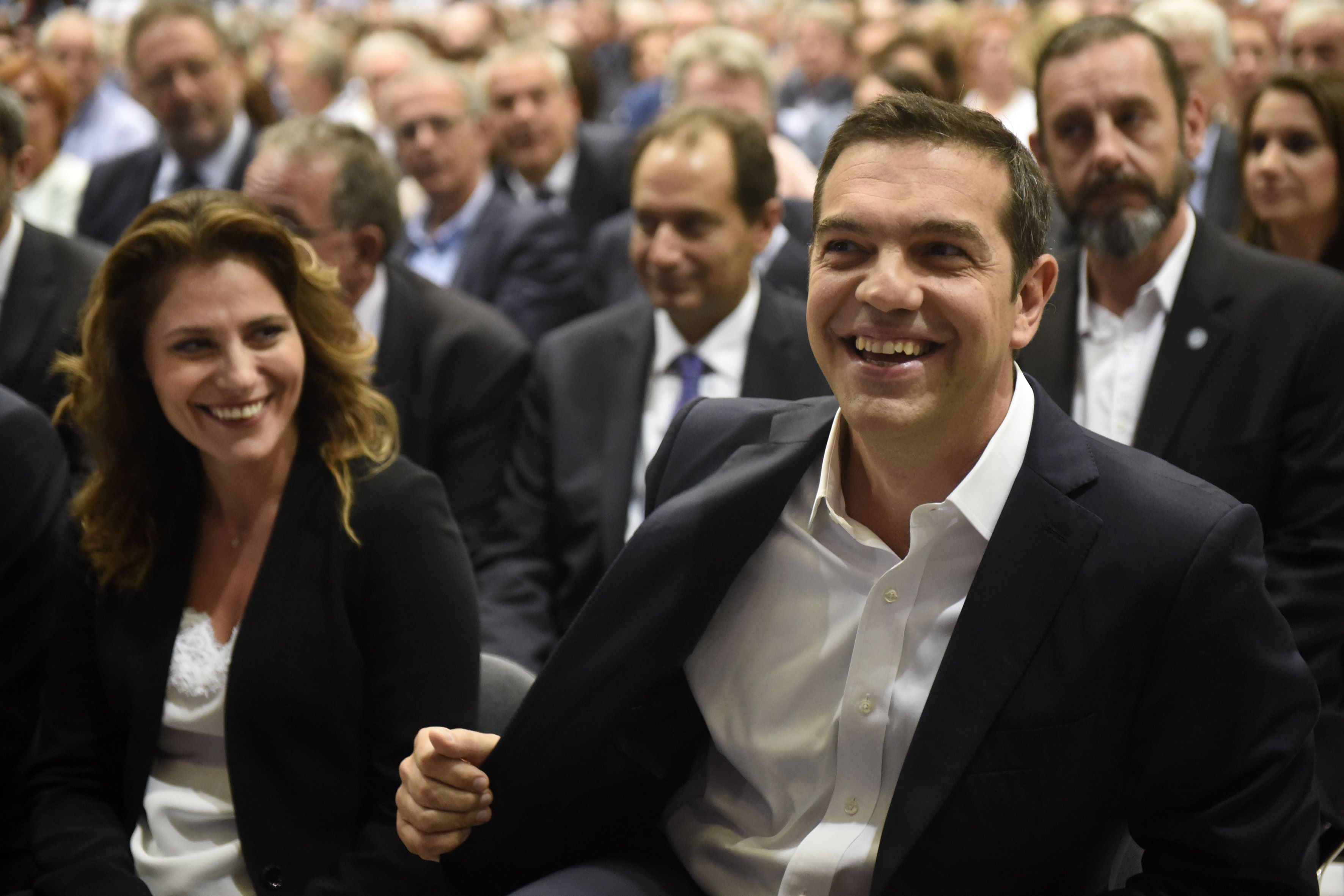Greek PM vows bailout exit in 2018, help for workers, youth