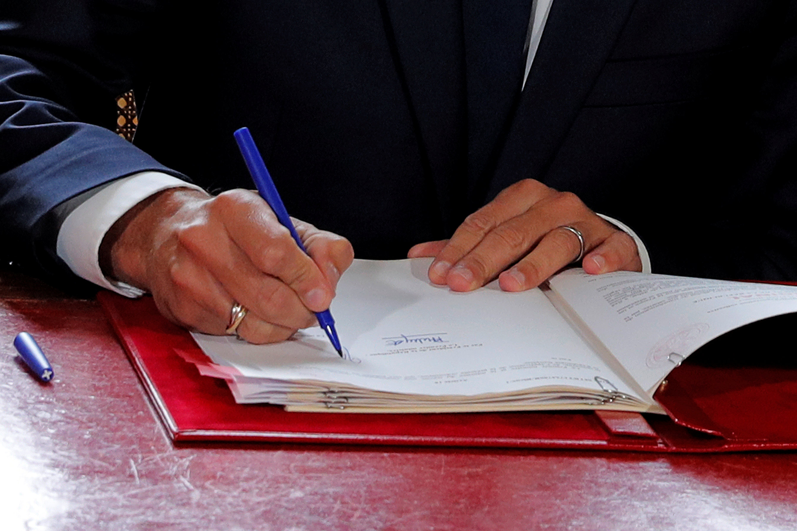 Macron signs French labour reform decrees