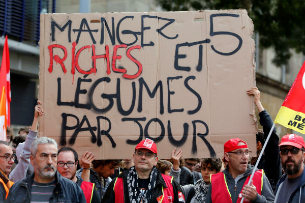 Striking French workers disrupt flights, schools