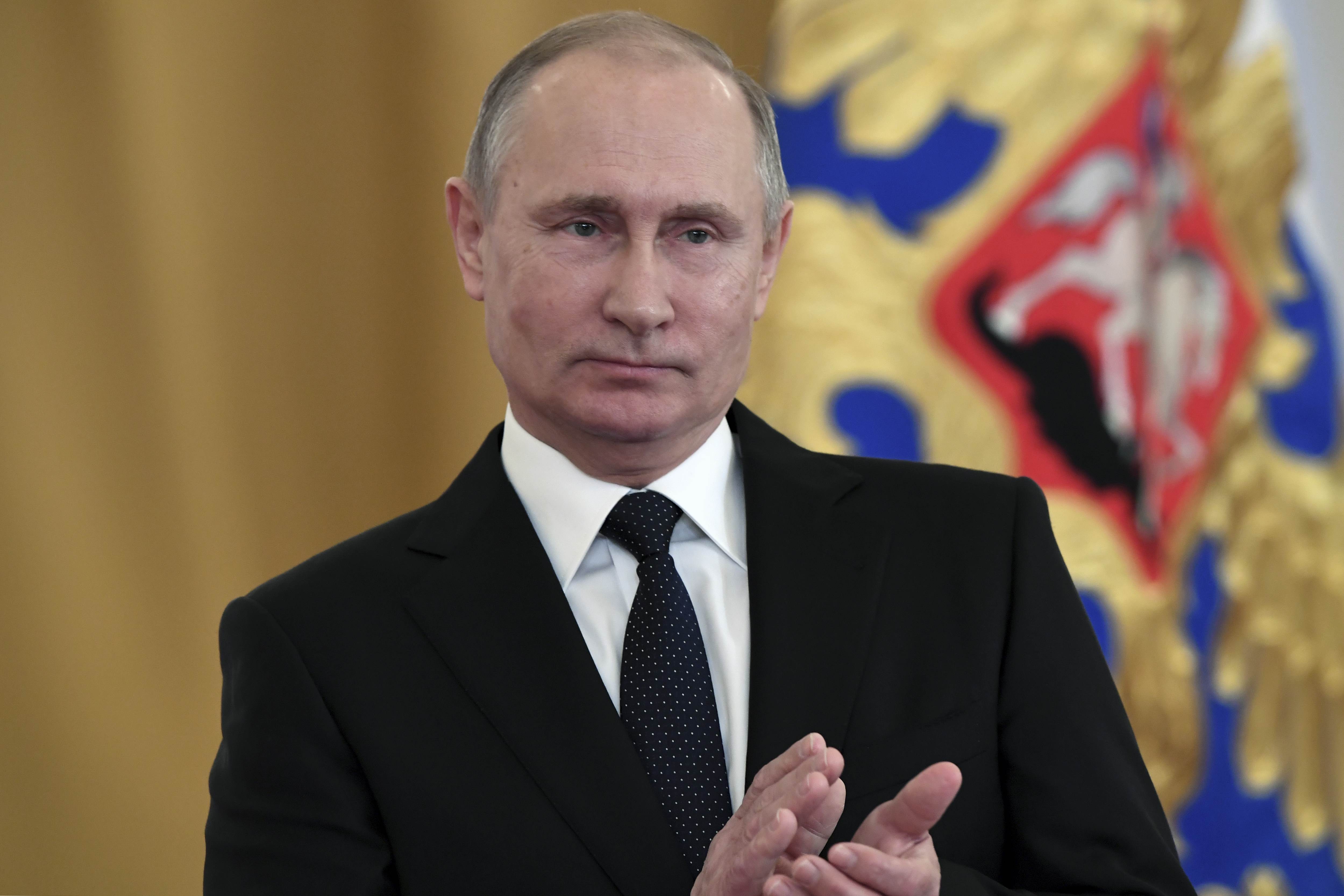 Putin says Russia to raise minimum wage from May 1