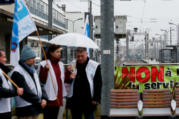 French rail unions take on Macron with mass rolling strikes