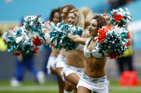 Former cheerleader alleges discrimination by Dolphins, NFL