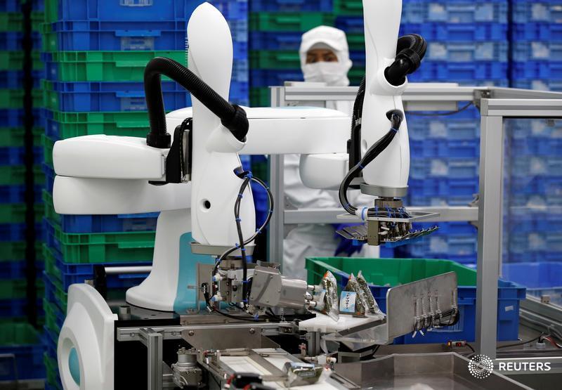 Japanese companies see big things in small-scale industrial robots