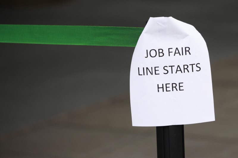 U.S. job openings hit record high, more workers quitting