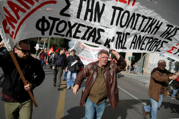 Greek workers strike, seeking higher wages, tax cuts