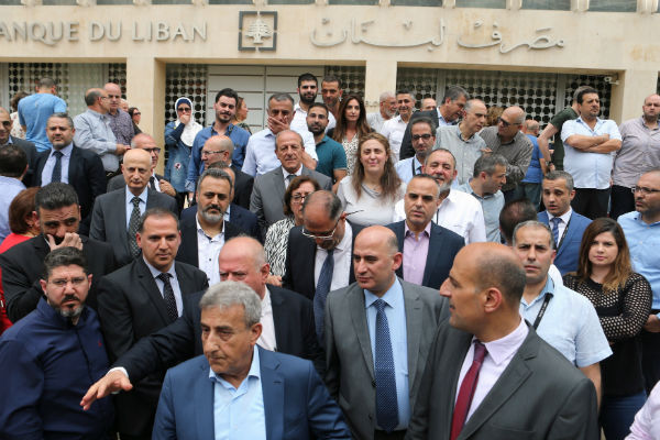 Lebanese central bank workers strike over proposed state budget cuts