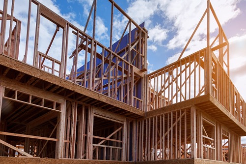 How is the softwood lumber shortage affecting Canadian home prices and supply?