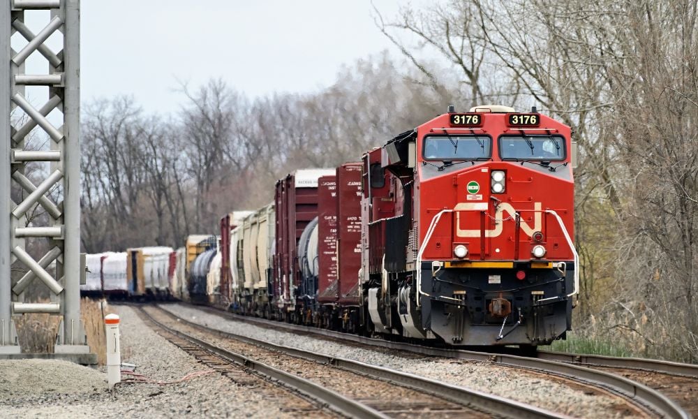 Wildfires and labour disputes cut into CN Rail’s profits despite revenue growth