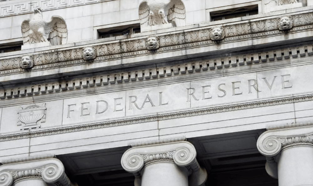 Fed holds rates steady as Trump ramps up attacks on Powell