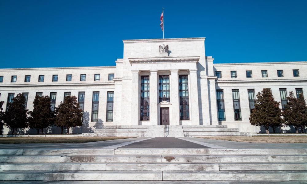 Powell indicates Fed would have made cuts if not for tariffs