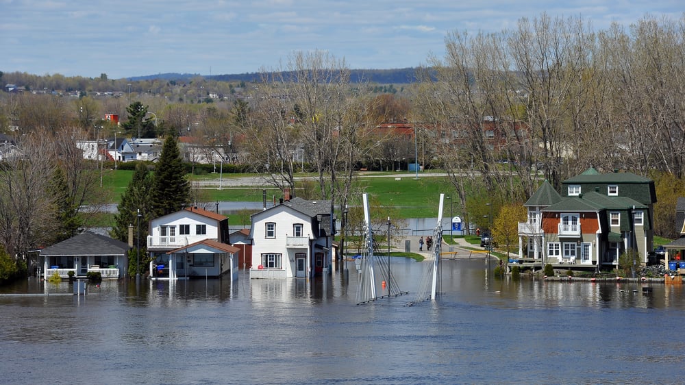 How does flooding affect Canada's housing values?