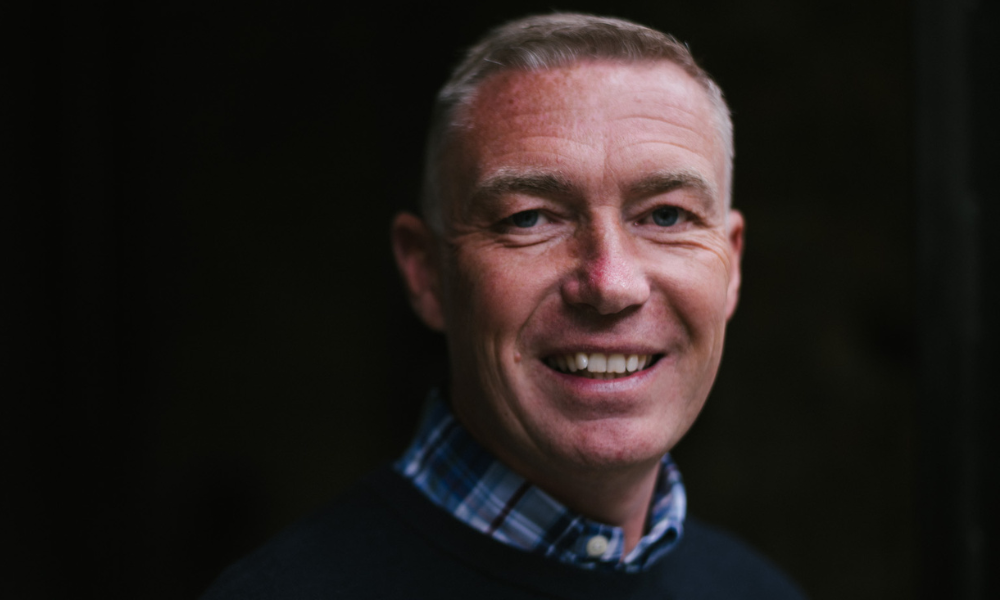 Bank director gave up a football career and scored in financial services
