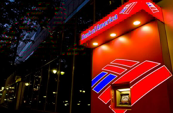 Moody's cuts ratings of BofA, Wells