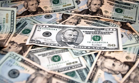 Corporate cash piling up — but not dividend checks