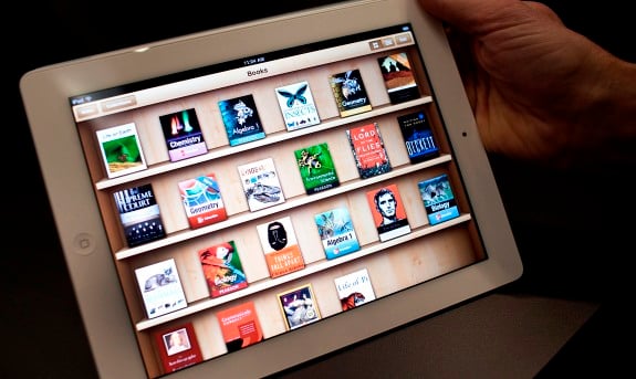 Will cash-rich Apple peel off a few bills for shareholders?