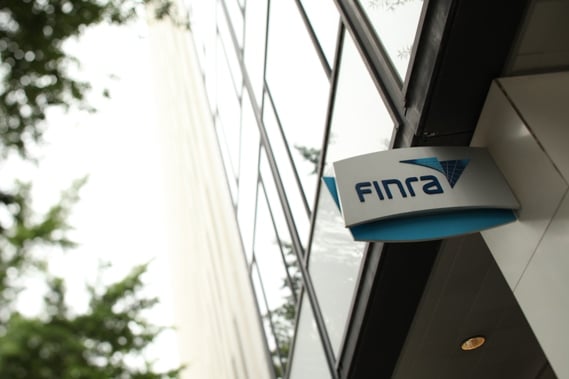 Finra board member resigns in wake of charges