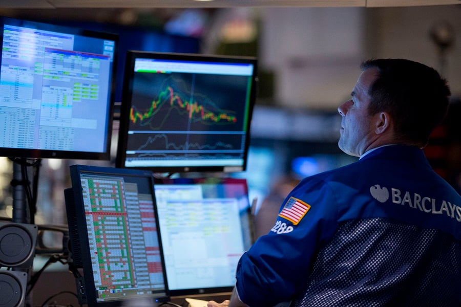 More money managers say U.S. stocks overvalued, cut holdings but add Europe, Japan