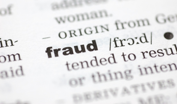 Former brokerage firm chief compliance officer charged with fraud