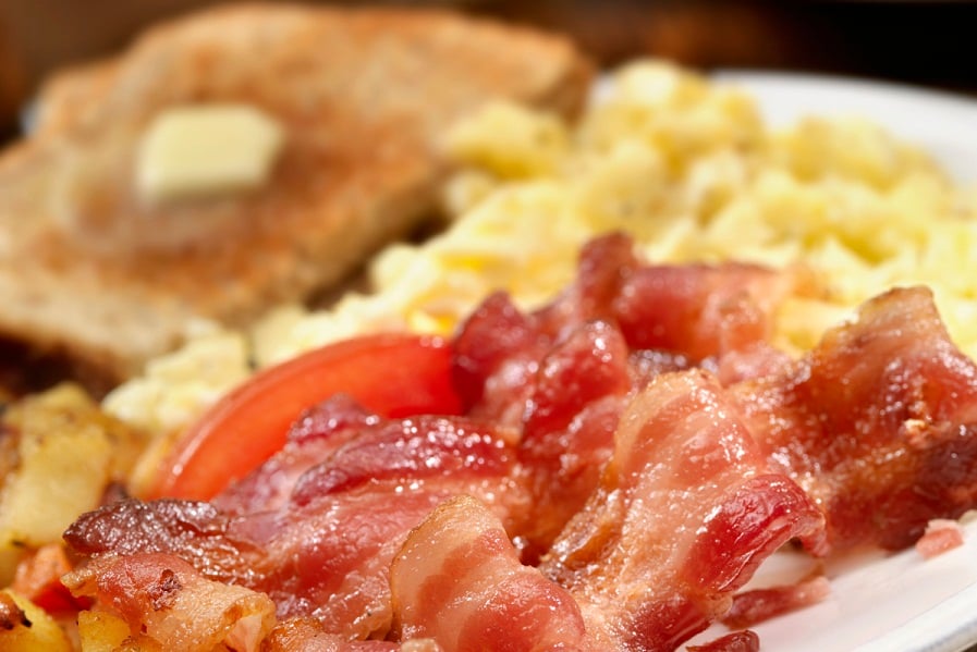 Food is the focus for this financial planner, who meets clients over bacon and eggs