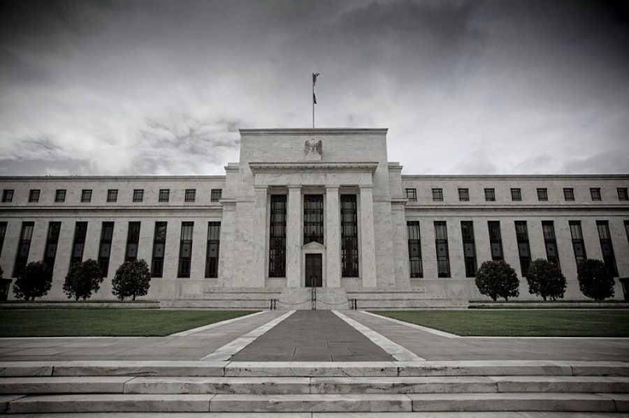 Fed raises interest rates by half point as it signals borrowing costs will head higher next year