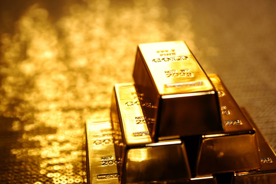 Gold shrinks from new record as investors look ahead to Jackson Hole