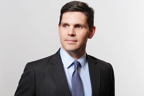 AIG brings in two new heads