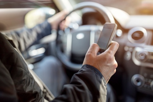 Income, Grab partner to offer microinsurance for drivers