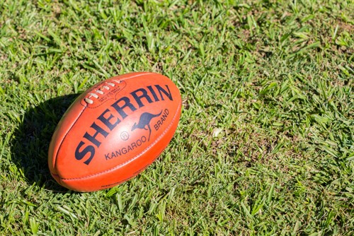 QBE and Sydney Swans to kick goals for charity